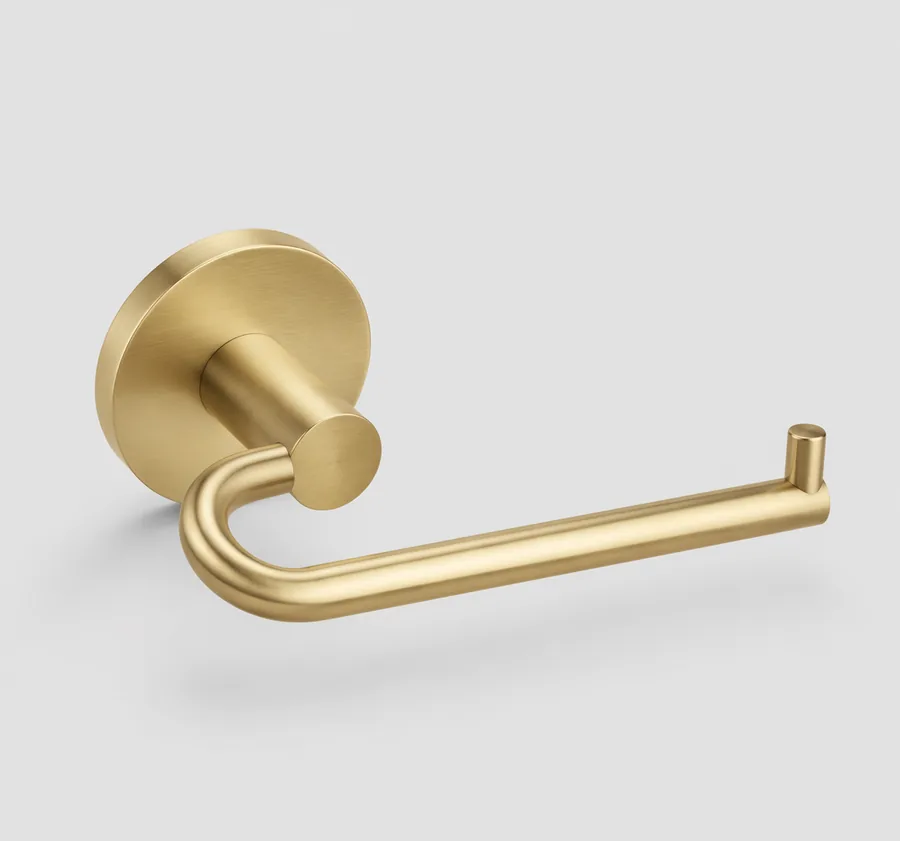 Rolla brushed gold toilet paper holder, studio product photo